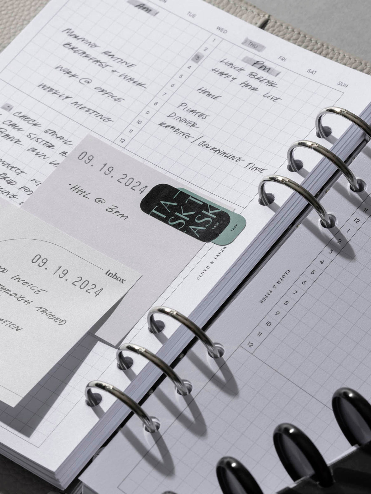 Luxe Page Flag use inside a white leather planner.