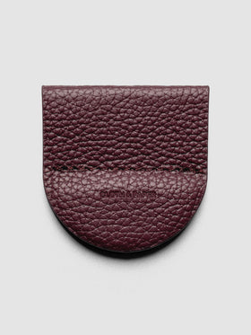 Image shows the Magnetic Bookmark | Pen Holder in Bordeaux, a deep red, displayed on a neutral background.