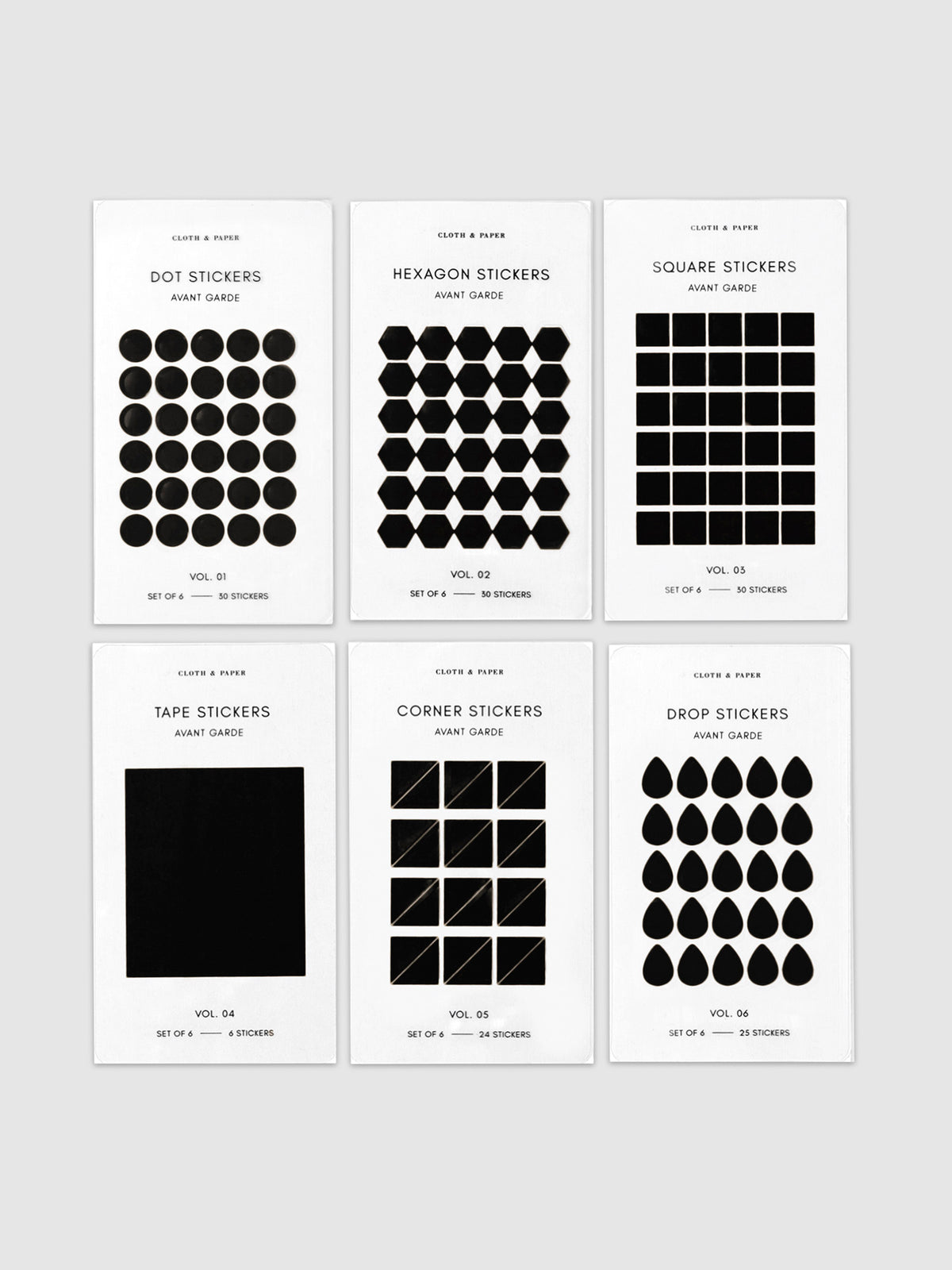 Mini Shape Sticker Set, Transparent, Avant Garde, Cloth and Paper. One of each sticker sheet laid out next to each other, 3 on top and 3 below. Stickers sheets are all perpendicular to each other, turned slightly to the right against a neutral background.