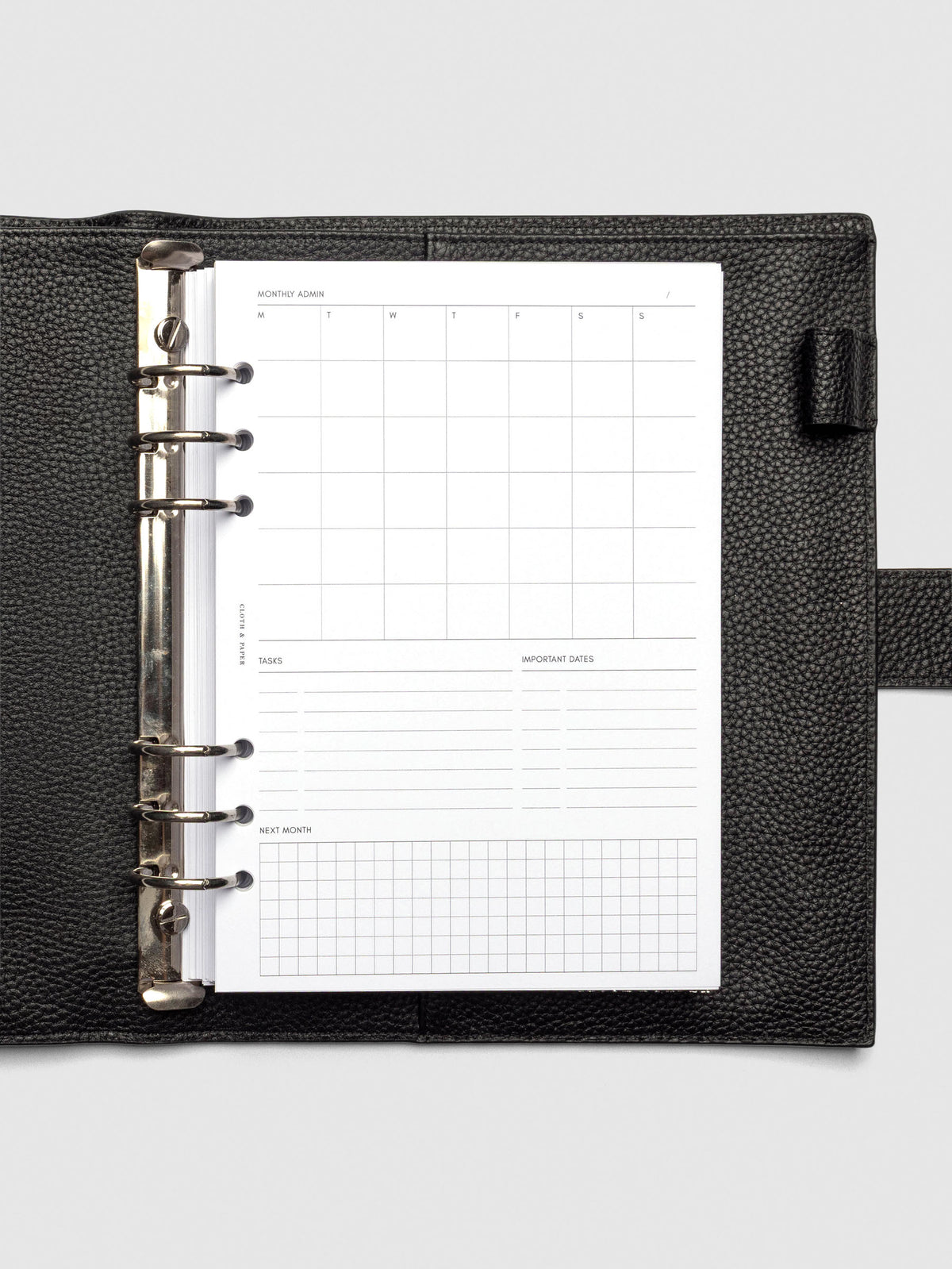 Insert in use inside a black leather planner.