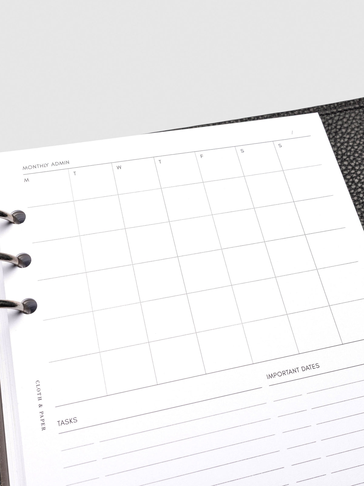 Insert in use inside a black leather planner.