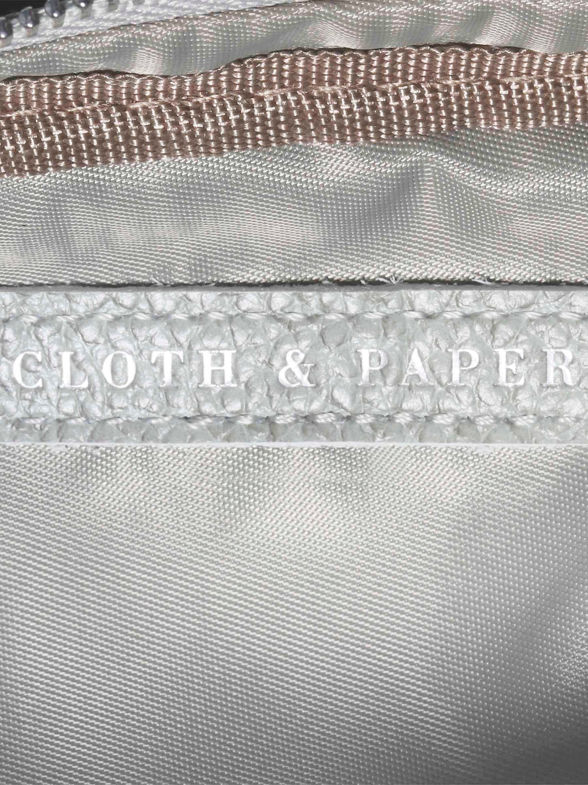 Closeup of Cloth and Paper logo inside Ristretto pouch. 