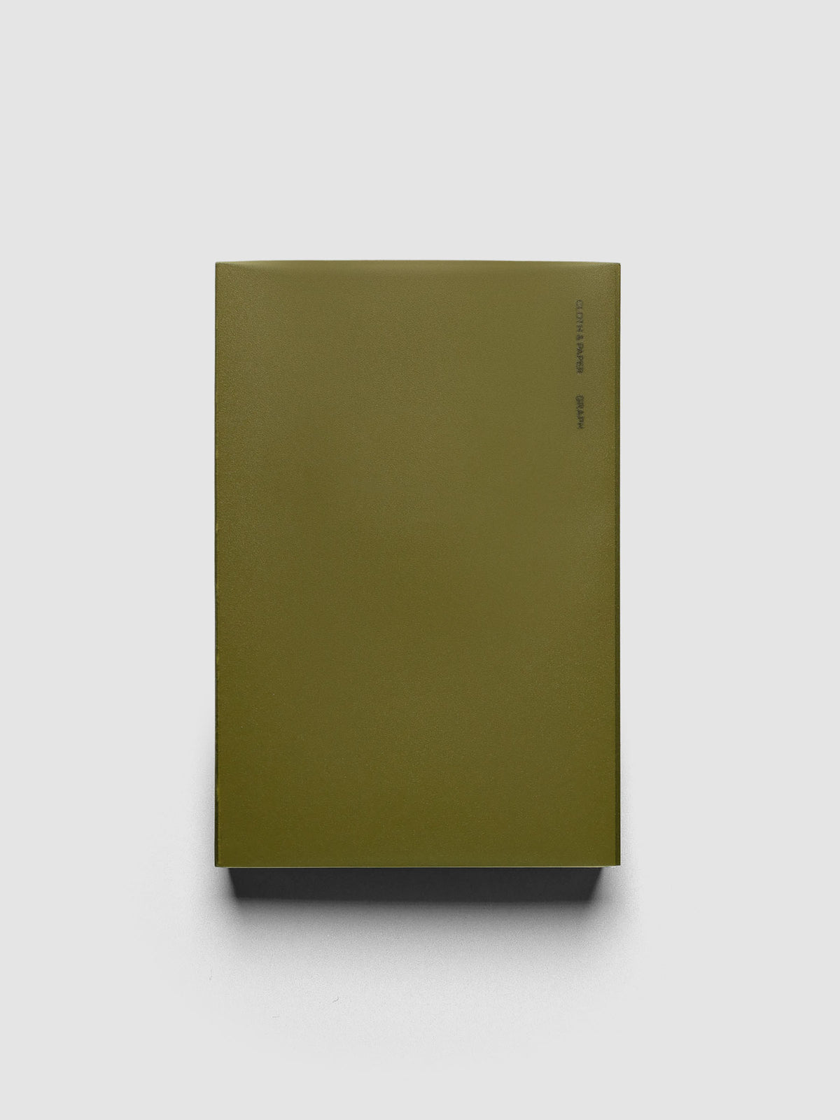 Perfect Bound Notebook | CP Petite | Graph | Olive shown laying flat, closed, on a neutral background.
