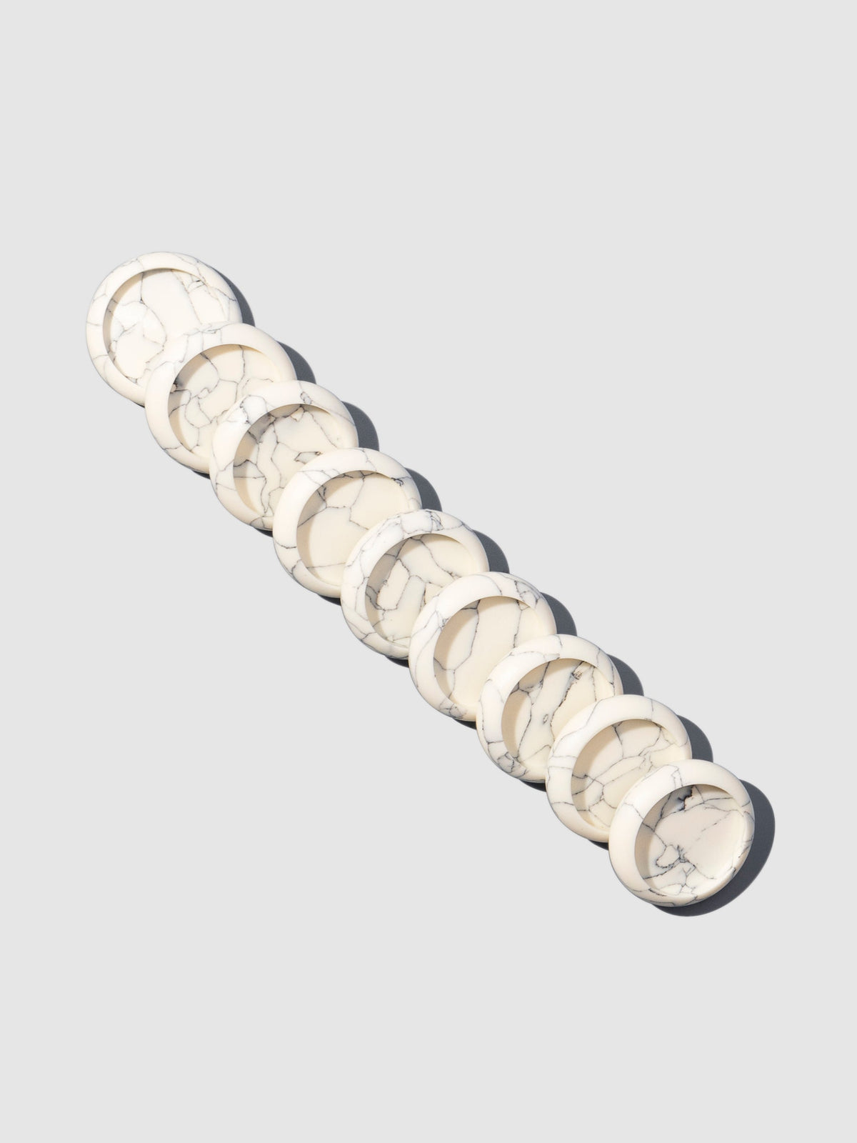 Planner Discs, White Marble, 0.75 inches, Cloth and Paper. Set of 9 discs displayed on a neutral background.