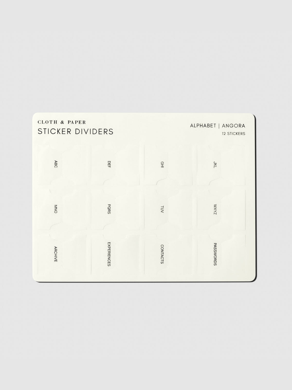 Planner Sticker Dividers, Cloth and Paper. Sticker sheet displayed on a neutral background. Design shown is Alphabet in the color Angora.