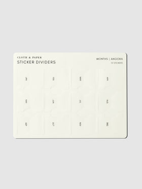 Sticker sheet displayed on a neutral background. Design shown is Months in the color Angora.