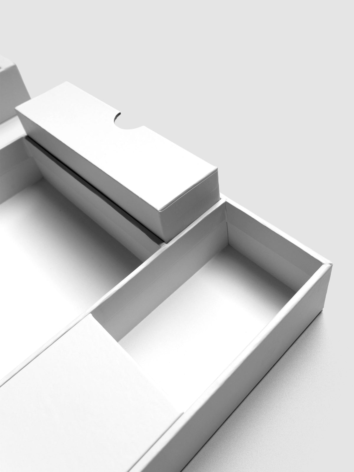 Storage Book 4.0 displaying empty right hand side top drawer compartment and open side compartment.