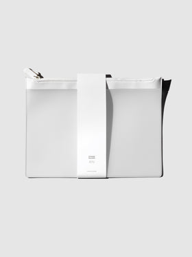 Storage Holders, Cloth and Paper. Bag shown with its belly band packaging on a neutral background.