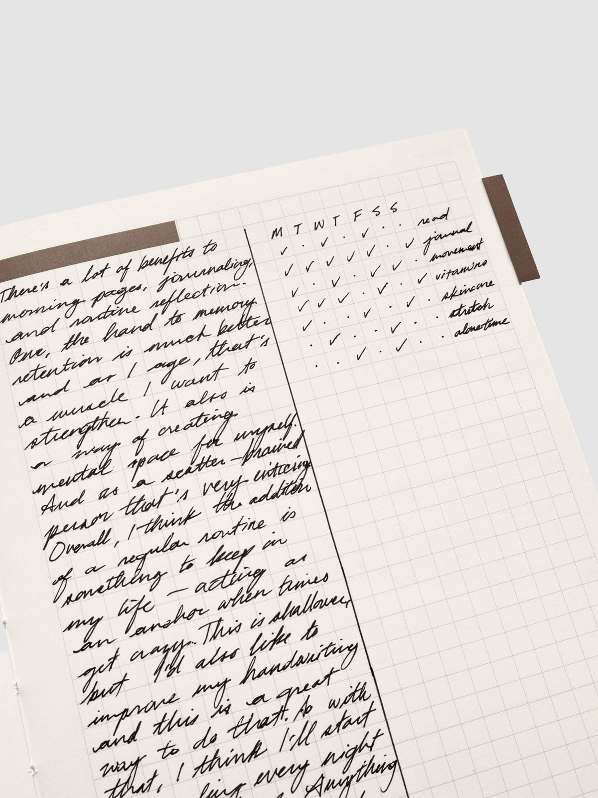 Close up of the Perfect Bound Notebook | A5 | Weekly Agenda | Matcha showing the graph notes layout with handwritten notes as an example for use.