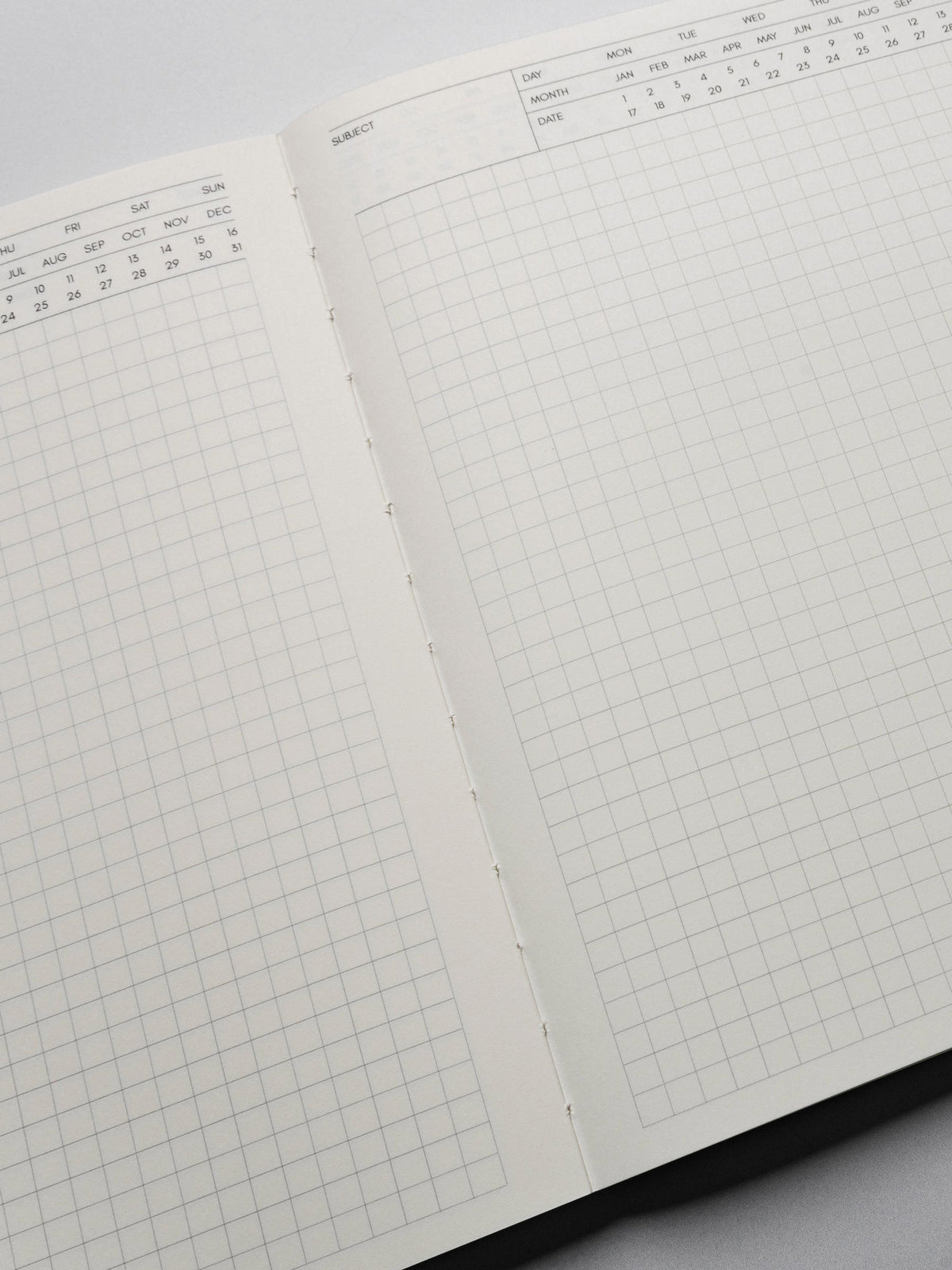 Perfect Bound Notebook in size HP Classic with Executive Notes pages shown close up, showing the center binding with the pages open.