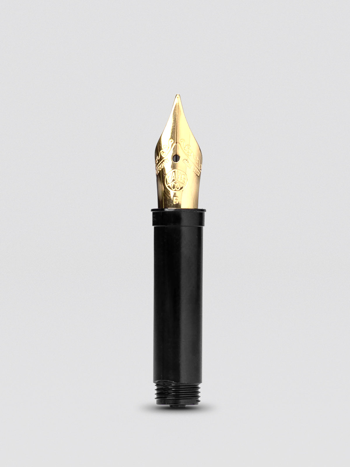 Kaweco replacement fountain pen nib, fine, gold color, close product view on white background.