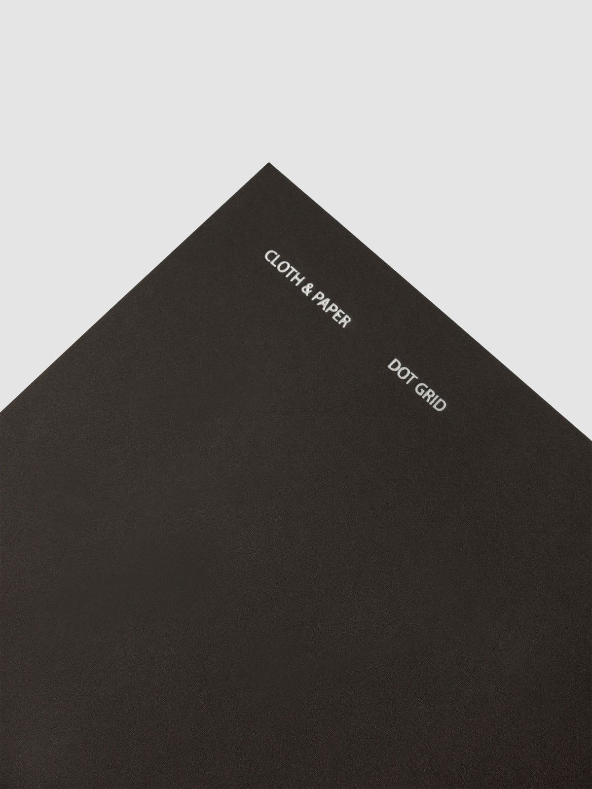 Travel Notebook | A5 Slim | Avant Garde | Dot Grid notebook shown as a close up of the cover with foiling details.