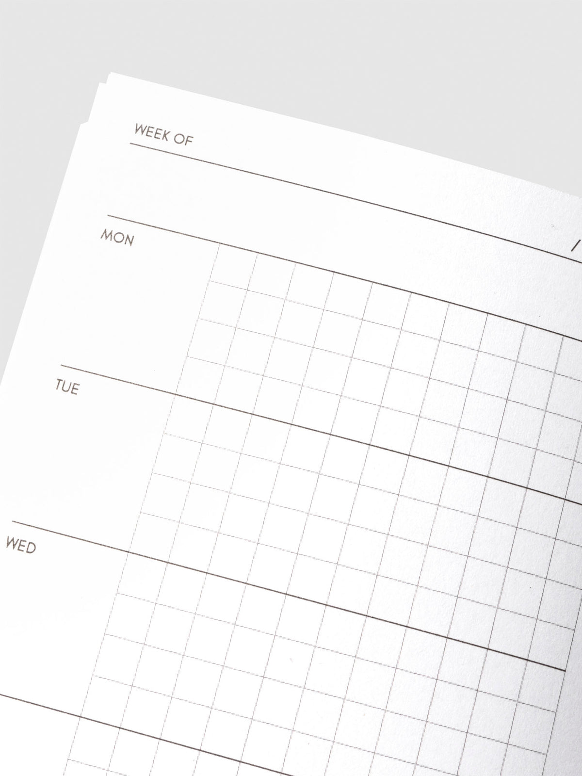 Close-up of the weekly planning grid in the Travel Notebook | Pocket Plus | Weekly Hobonichi Style, showing days of the week and grid lines for structured planning.