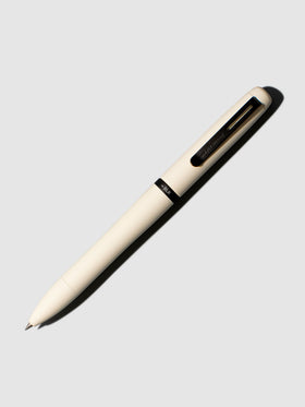 Pen shown on a neutral background with its tip exposed. Color shown is Cloudy White.