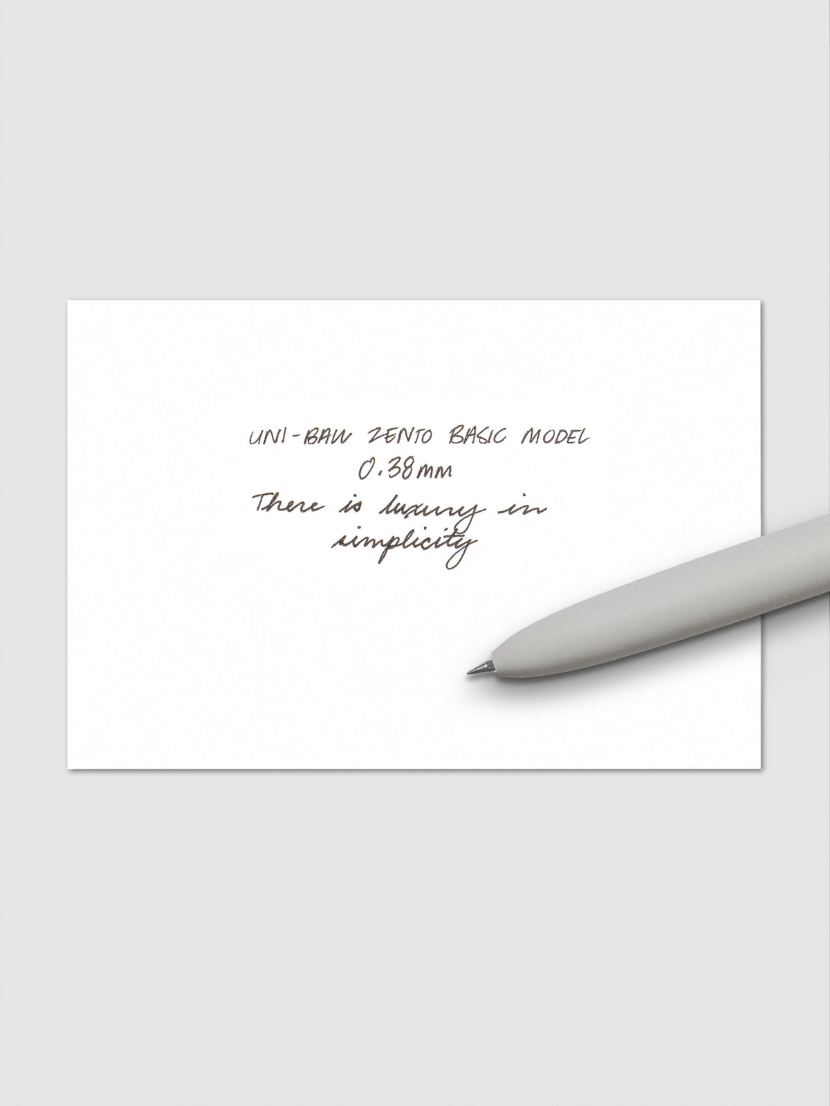 Handwritten writing sample using the Uni-ball Zento Basic Model Pen in Black with nib size 0.38 mm.