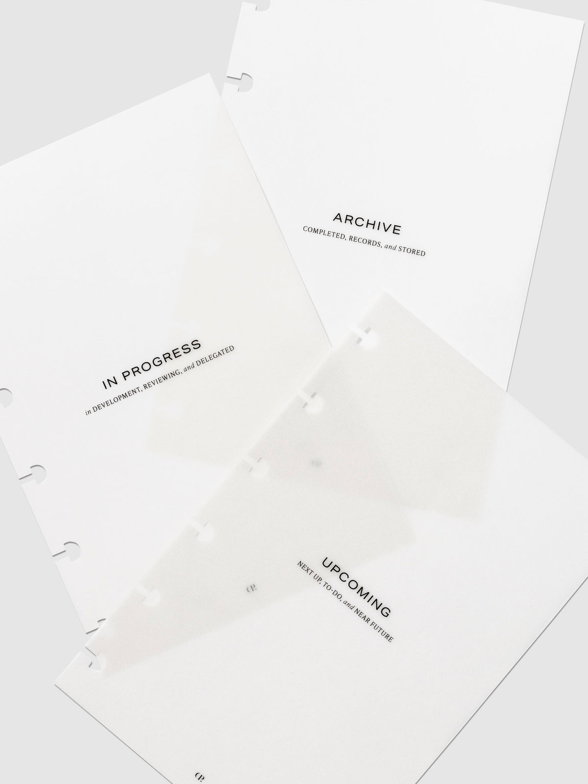 Volume 1 | Lifestyle dashboards arranged on a neutral background. From top to bottom, they read - "upcoming" "in progress" and "archive."