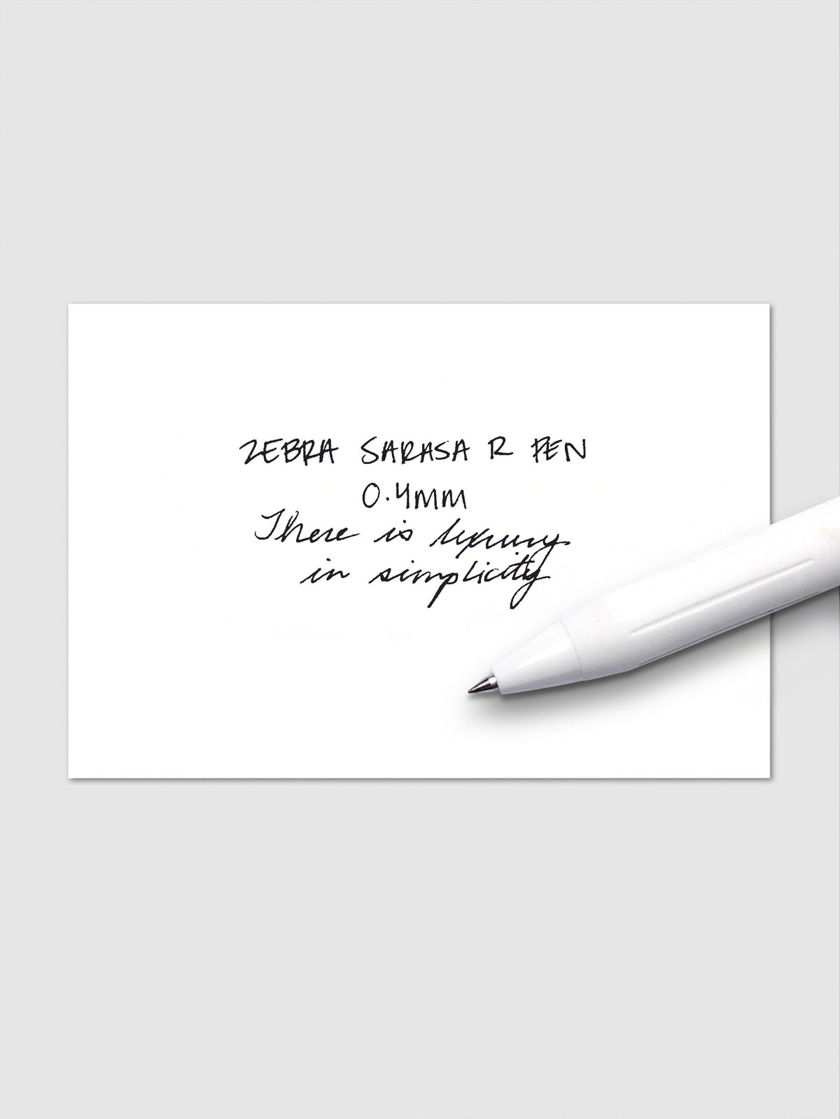 Writing sample using Zebra Sarasa R 0.4mm pen in black ink on white paper.